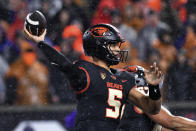 FILE - Oregon State quarterback DJ Uiagalelei (5) looks to throw a pass against Washington during the first half of an NCAA college football game Saturday, Nov. 18, 2023, in Corvallis, Ore. The biggest new addition for Florida State is at quarterback where one-time Clemson starter D.J. Uiagalelei takes over for Jordan Travis, who helped Florida State to its first ACC championship in nine years. (AP Photo/Mark Ylen, FIle)