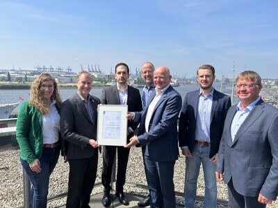 AiP Handing Over Ceremony on May 21, 2024. In attendance  Peter Jackson and Dimitrios Panagopoulos from Seaspan Corporation, Colin Rawlins from Lloyd's Register, and Helge Voigt, Hans-Jürgen Voigt, Fridtjof Rohde, and Britta Wodecki from Technolog (CNW Group/Seaspan Corporation)