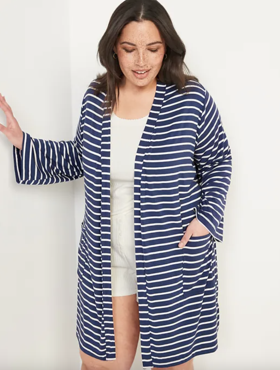 model in blue and white striped Sunday Sleep Ultra-Soft Tie-Belt Robe (Photo via Old Navy)