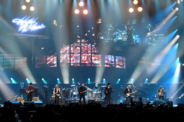 <p>Ethan Miller/Getty</p> (L-R) Vince Gill, Timothy B. Schmit, Don Henley, Scott F. Crago, Deacon Frey, Joe Walsh and Steuart Smith of the Eagles perform at MGM Grand Garden Arena on September 27, 2019 in Las Vegas, Nevada