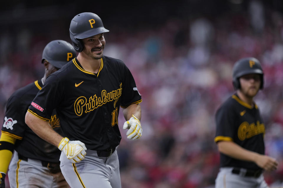 Pittsburgh Pirates' Bryan Reynolds smiles after his two-run home run against the Cincinnati Reds during the first inning of a baseball game Tuesday, June 25, 2024, in Cincinnati. (AP Photo/Carolyn Kaster)