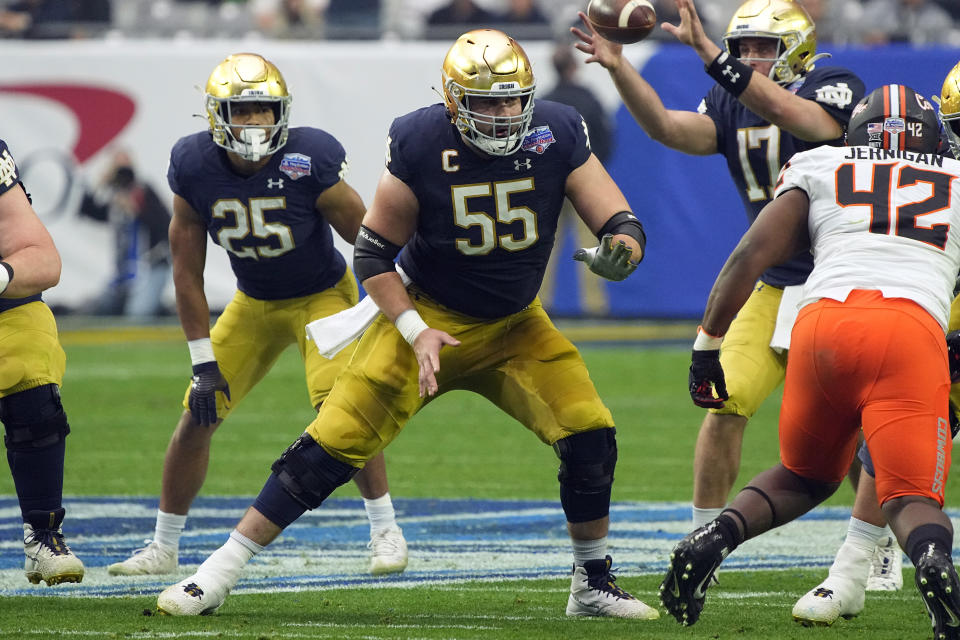 FILE - Notre Dame offensive lineman Jarrett Patterson (55) plays during the second half of the Fiesta Bowl NCAA college football game against Oklahoma State, Saturday, Jan. 1, 2022, in Glendale, Ariz. Patterson was named to The Associated Press preseason All-America team, Monday, Aug. 22, 2022. (AP Photo/Rick Scuteri, File)