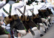 <p>So-called “Schellenruehrer” (bell ringers) carnival characters parade through the streets of Mittenwald, southern Germany, as the hot carnival season starts on Women’s Carnival, Feb. 23, 2017. (Photo: Angelika Warmuth/AFP/Getty Images) </p>