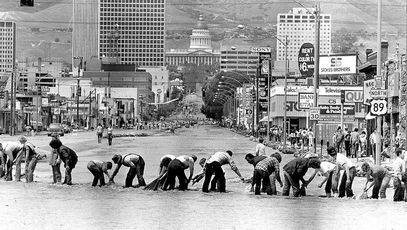 Sandbaggers work on 700 South in Salt Lake City as State Street is turned into a river due to flooding in the spring of 1983. Since 1983, Utah has become more prepared to face the potential floods that could follow the long 2023 winter season.