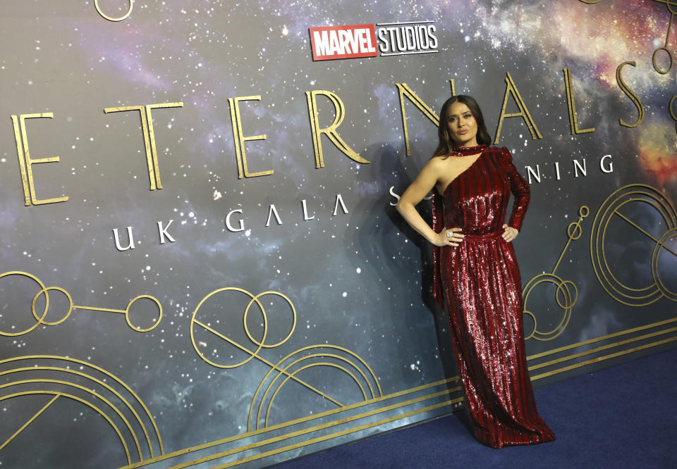 Salma Hayek poses for photographers upon arrival at the premiere of the film 'Eternals' on Wednesday, Oct. 27, 2021 in London. (Photo by Vianney Le Caer/Invision/AP)