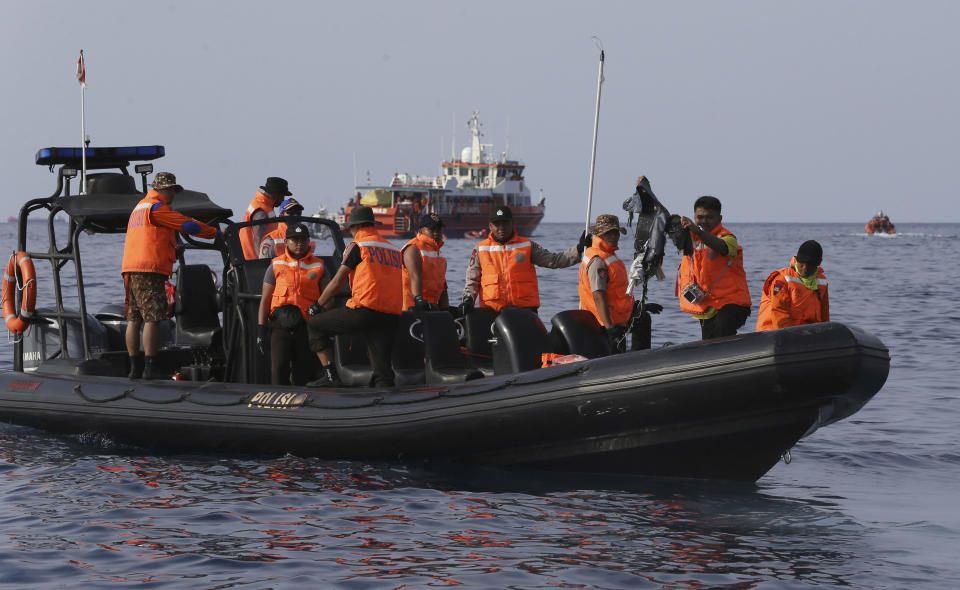 Rescuers conduct search operation in the waters of Ujung Karawang, West Java, Indonesia after a Lion Air plane crashed into the sea Monday, Oct. 29, 2018. A Lion Air flight crashed into the sea just minutes after taking off from Indonesia's capital on Monday in a blow to the country's aviation safety record after the lifting of bans on its airlines by the European Union and U.S. (AP Photo/Achmad Ibrahim)