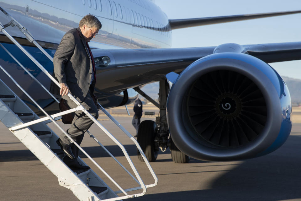 Attorney General William Barr steps off an aircraft at Glacier Park International Airport, Thursday, Nov. 21, 2019, in Kalispell, Mont. Barr is scheduled Friday to visit Flathead Reservation to address the issue of missing and murdered indigenous persons. (AP Photo/Patrick Semansky)