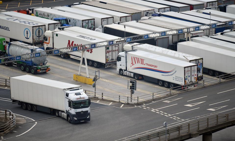 A Freight lorry (L) prepares to leave the Port of Dover after disembarking from a cross-channel ferry, in Dover on the south coast of England on June 12, 2020. - Britain will apply 