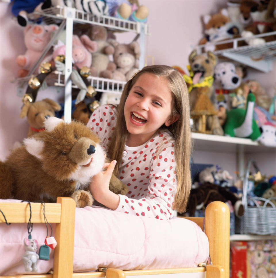 Mae Whitman surrounded by her toys, circa 1996, the year she appeared 