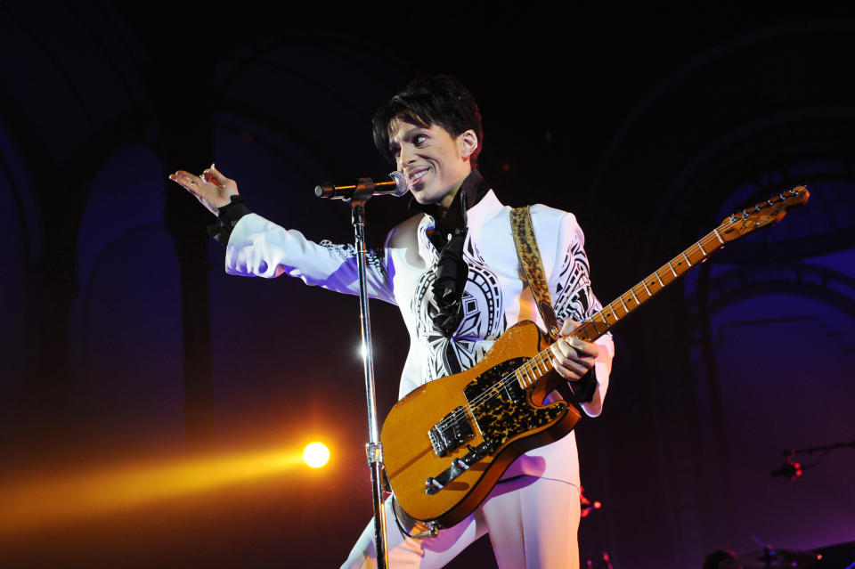 US singer Prince performs on October 11, 2009 at the Grand Palais in Paris. Prince has decided to give two extra concerts at the Grand Palais titled 'All Day/All Night' after he discovered the exhibition hall during Karl Lagerfeld's Chanel fashion show. AFP PHOTO BERTRAND GUAY (Photo credit should read BERTRAND GUAY/AFP/Getty Images)