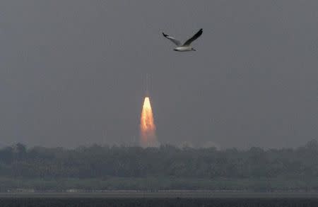 India's Polar Satellite Launch Vehicle (PSLV-C25), carrying the Mars orbiter, lifts off from the Satish Dhawan Space Centre in Sriharikota, about 100 km (62 miles) north of the southern Indian city of Chennai November 5, 2013. REUTERS/Babu/Files