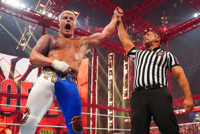 Cody Rhodes being declared the winner of his match by the referee