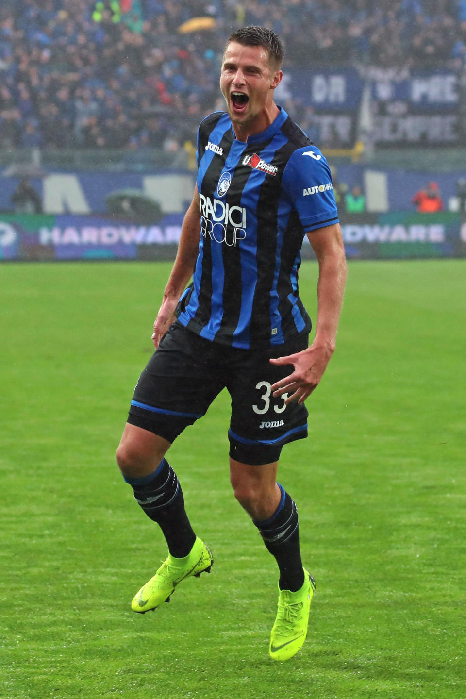 Atalanta's Hans Hateboer celebrates after scoring his side's opening goal during the Serie A soccer match between Atalanta and Inter Milan, in Bergamo, Italy, Sunday, Nov. 11, 2018. (Paolo Magni/ANSA via AP)