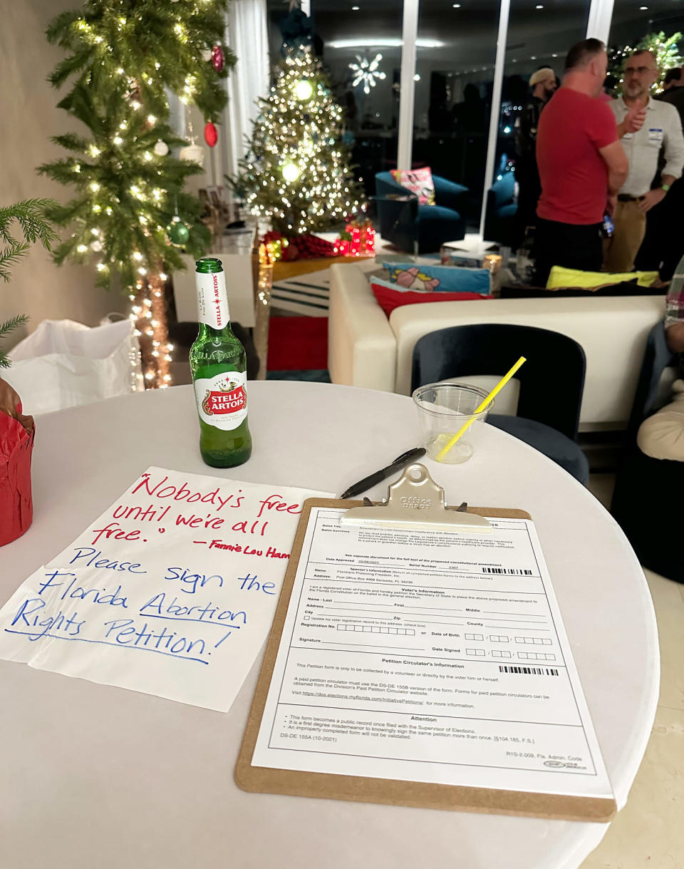 Petition on a table at holiday party. (Florida Women’s Freedom Coalition)