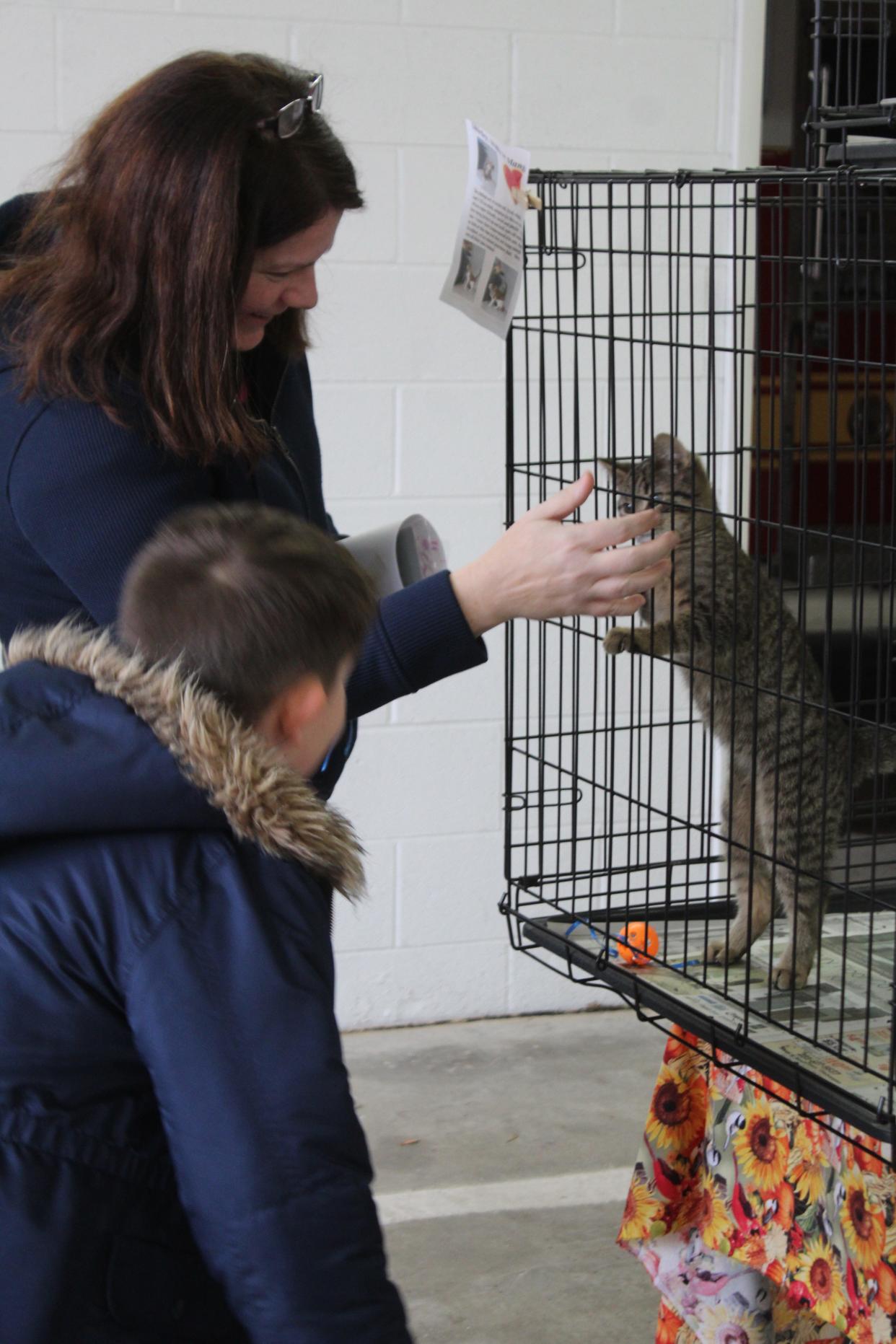 Last week, the Cheboygan County Humane Society hosted an adoption event with several animals from their facility at Cheboygan City Hall and the city's fire department. Many people, including Katie and Warren Mallory, turned out to see the animals.