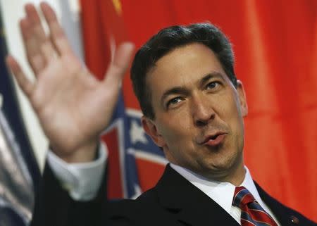 Tea Party candidate Chris McDaniel waves to supporters before delivering a concession speech in Hattiesburg, Mississippi, June 24, 2014. REUTERS/Jonathan Bachman