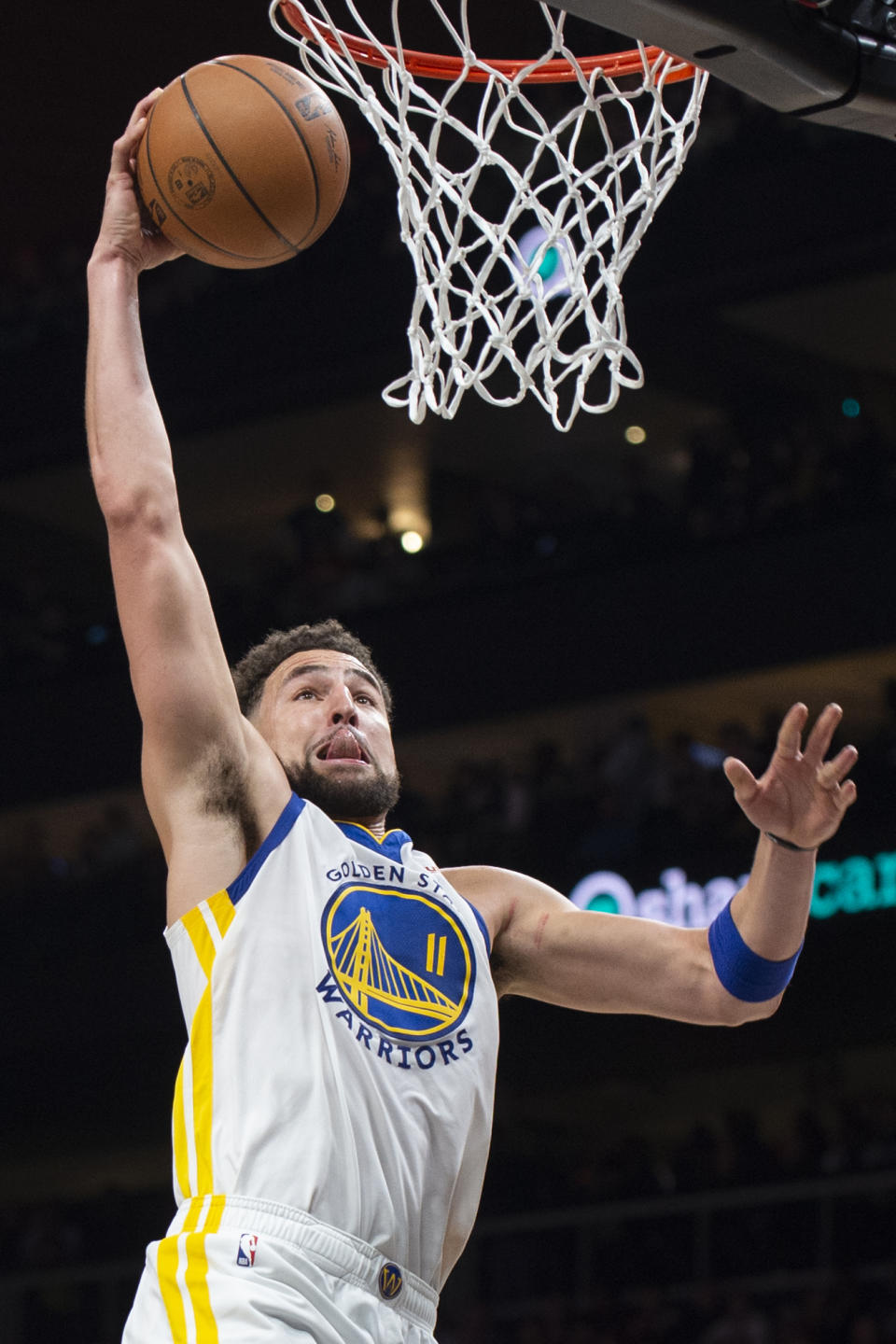 Golden State Warriors guard Klay Thompson scores during the first half of an NBA basketball game against the Atlanta Hawks, Friday, March 17, 2023, in Atlanta. (AP Photo/Hakim Wright Sr.)