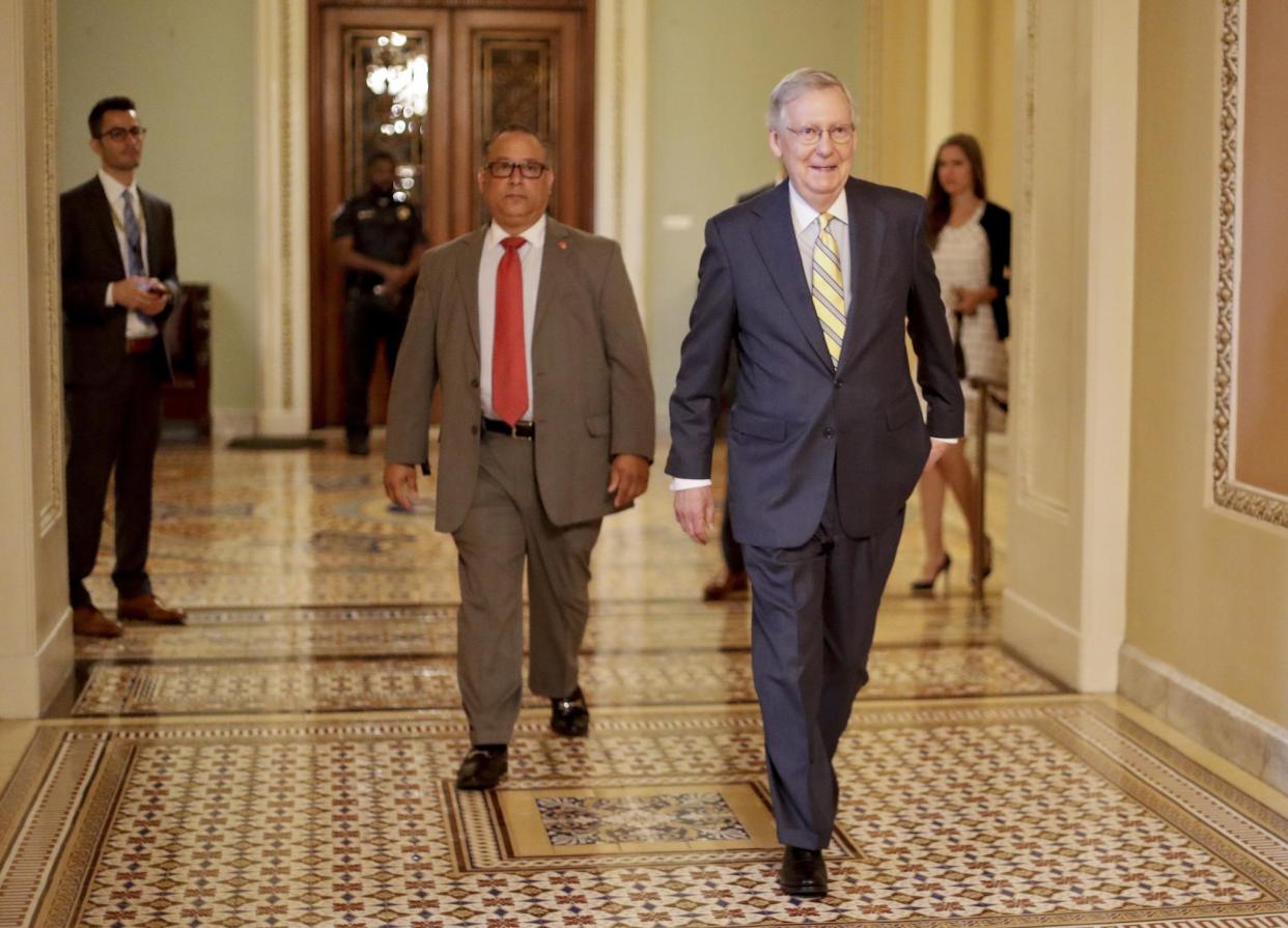 Senate Majority Leader Mitch McConnell walks to his office on Capitol Hill: AP