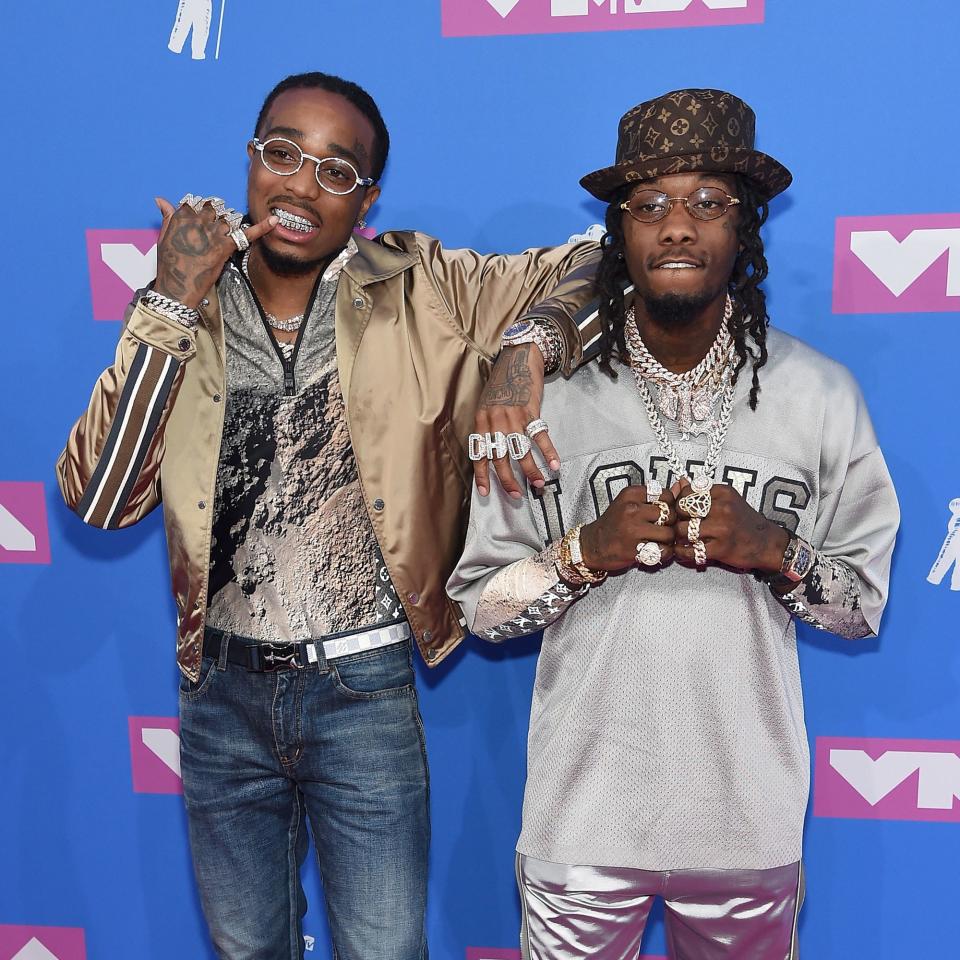 Offset and Quavo coordinated their metallic red carpet looks when they arrived at the 2018 MTV VMAs in New York City.