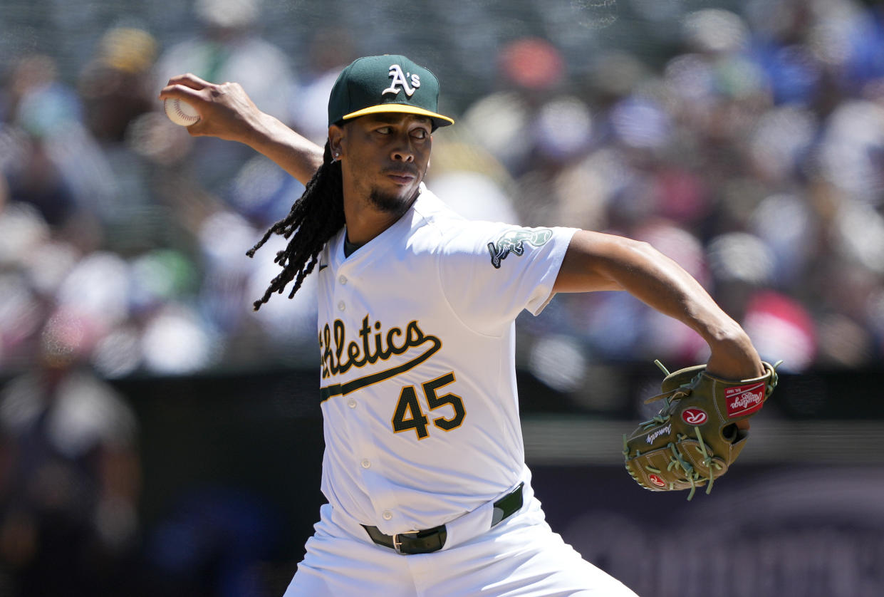 Osvaldo Bido #45 of the Oakland Athletics pitches against the Los Angeles Dodgers in the top of the first inning at the Oakland Coliseum on August 4, 2024 in Oakland, California. (Photo by Thearon W. Henderson/Getty Images)