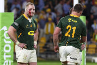 South Africa's Steven Kitshoff, left, reacts following his team's loss to Australia in their Rugby Championship test match in Brisbane, Australia, Saturday, Sept. 18, 2021. (AP Photo/Tertius Pickard)