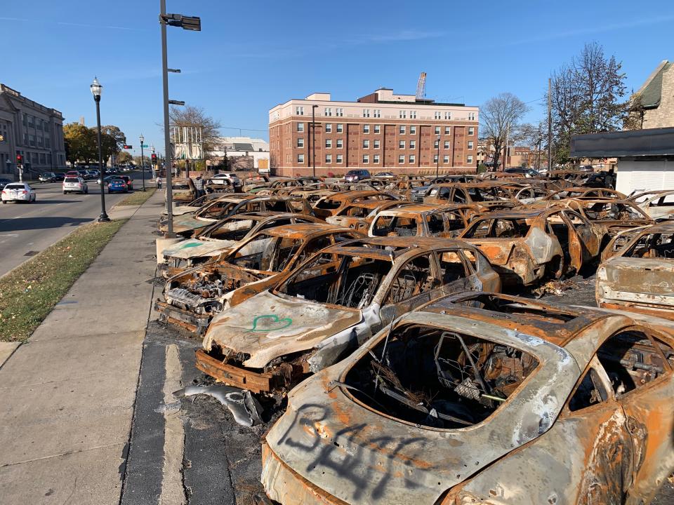 <p>Burned-out cars in downtown Kenosha, Wisconsin</p>Andrew Naughtie