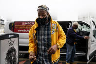 First time voter, Gary Ragland, 64, of East Point, Ga., arrives to State Farm Arena in a van provided by NACA for an event called "Roll to the Polls" to vote early on Wednesday, Oct. 28, 2020, in Atlanta. (AP Photo/Brynn Anderson)