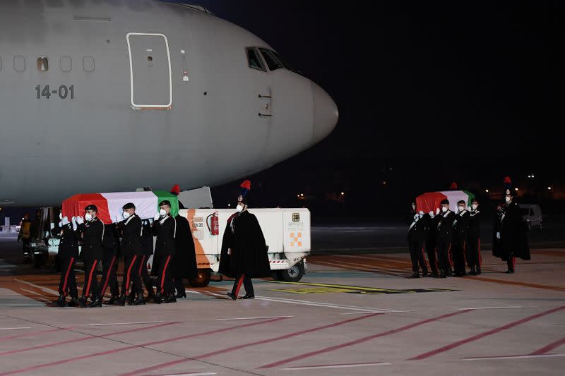 FILE PHOTO: The bodies of slain Italian ambassador and bodyguard return to Italy from the Congo