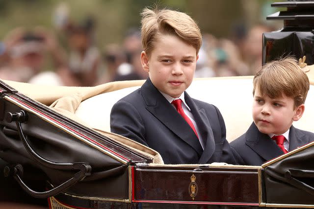 <p>HENRY NICHOLLS/AFP via Getty</p> Prince George and Prince Louis at Trooping the Colour 2023