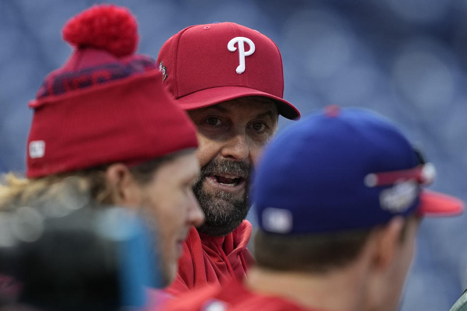 Philadelphia Phillies hitting coach Kevin Long watches during batting practice before Game 4 of baseball's World Series between the Houston Astros and the Philadelphia Phillies on Wednesday, Nov. 2, 2022, in Philadelphia. (AP Photo/David J. Phillip)