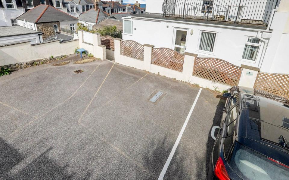 The spot (to the left of the car) sold for £45,000 - Miller Countrywide/Solent News & Photo Agency 