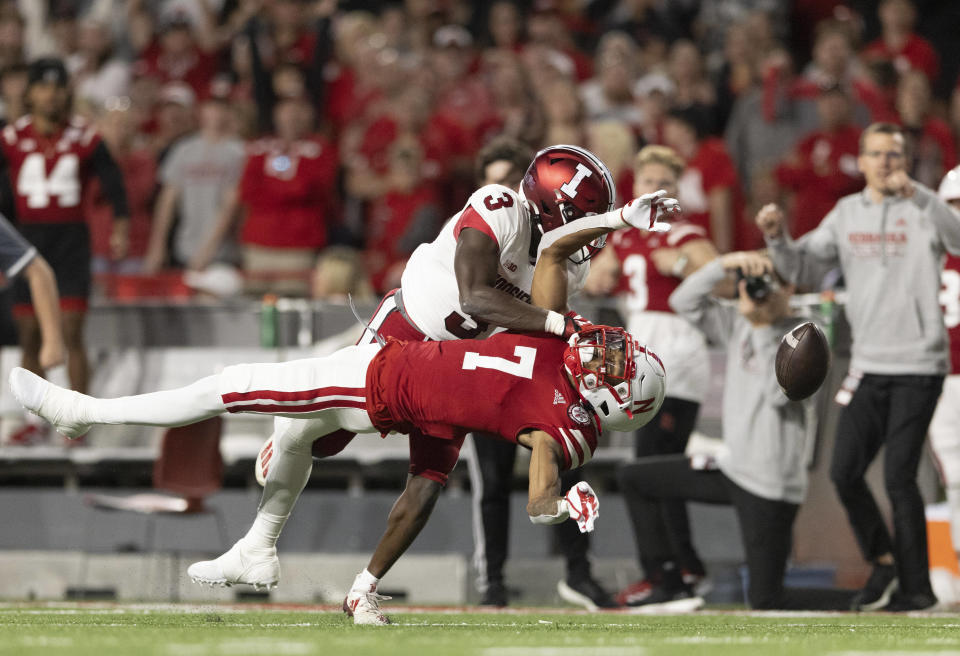 Indiana's Tiawan Mullen (3) breaks up a pass intended for Nebraska's Marcus Washington (7) during the second half of an NCAA college football game Saturday, Oct. 1, 2022, in Lincoln, Neb. (AP Photo/Rebecca S. Gratz)
