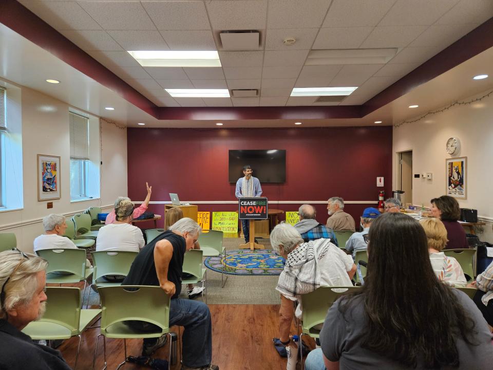 People gathered May 18, 2024, at the Beaver Area Memorial Library to hear Palestine native Ahmed Arafat talk about Gaza.