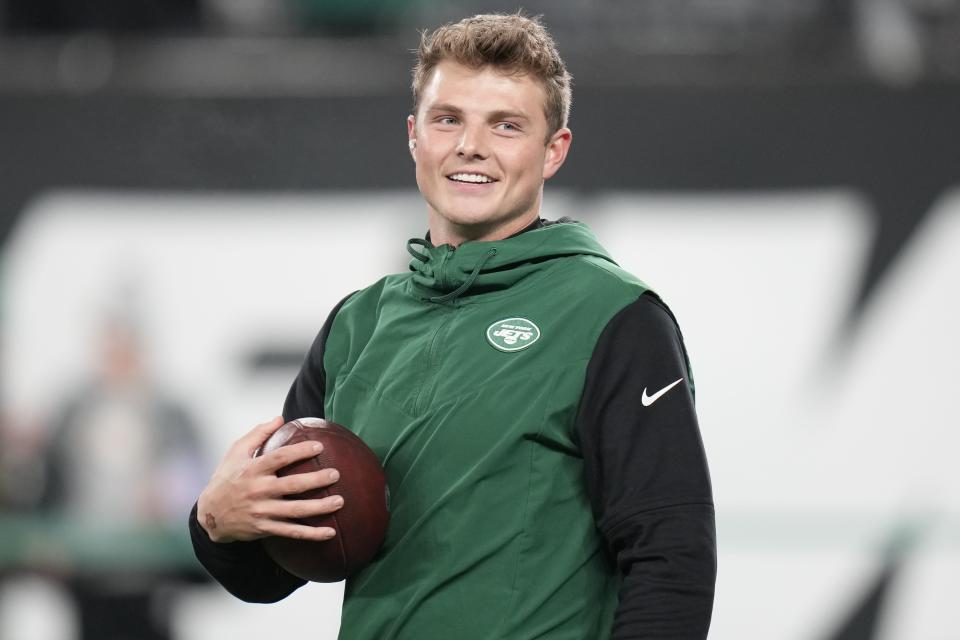 New York Jets quarterback Zach Wilson warms up before playing against the Jacksonville Jaguars in an NFL football game, Thursday, Dec. 22, 2022, in East Rutherford, N.J. | Seth Wenig, Associated Press
