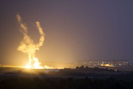 An Israeli rocket is fired into the northern Gaza Strip July 17, 2014. REUTERS/Amir Cohen