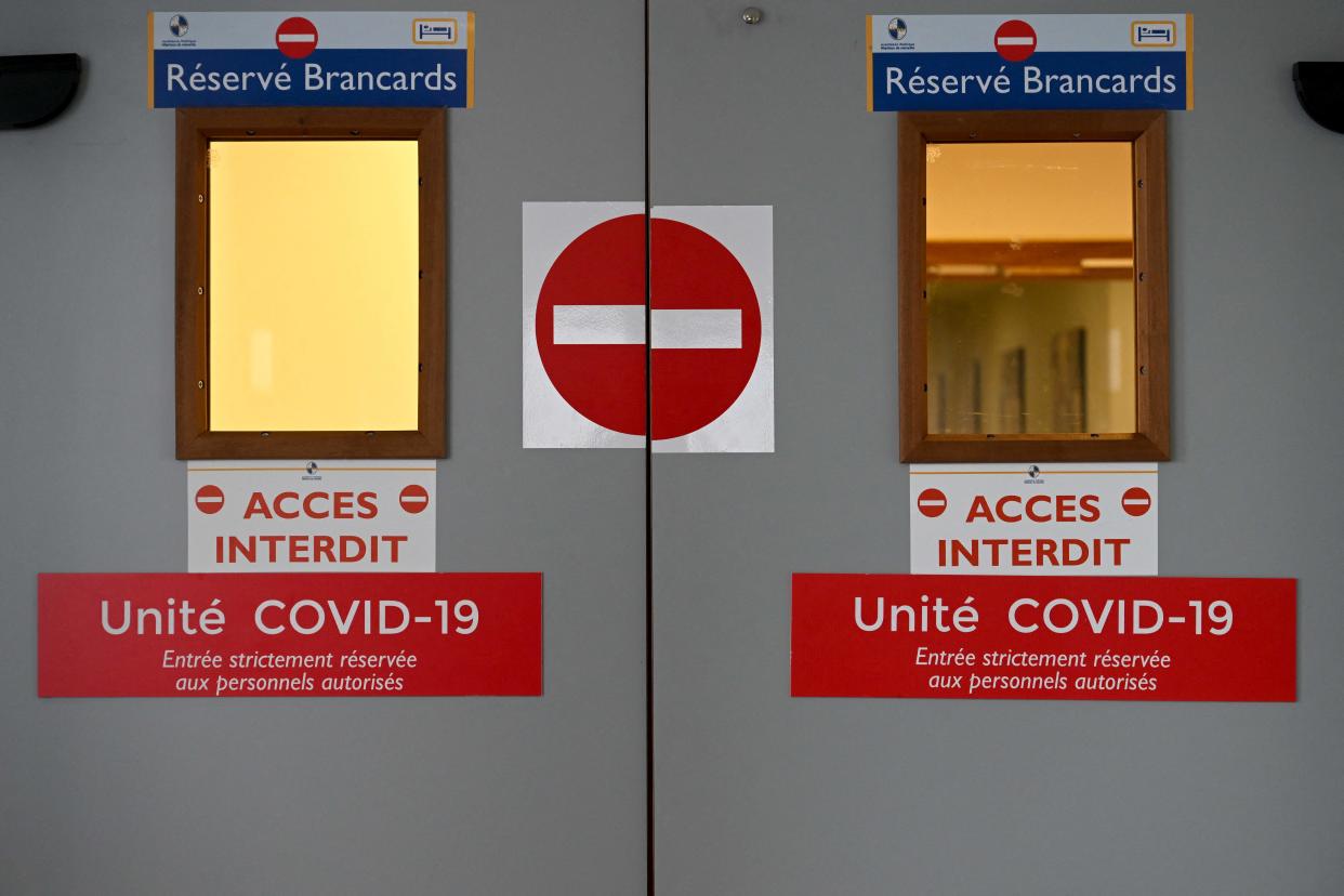 A photograph taken on January 5, 2022 shows the entrance of the intensive care unit for patients infected with the Covid-19 of the Timone hospital, in Marseille, southern France. - France set a record for new Covid cases over a 24-hour period on January 5, 2022 with 335,000 additional infections recorded, Health Minister Olivier Veran told parliament. (Photo by Nicolas TUCAT / AFP) (Photo by NICOLAS TUCAT/AFP via Getty Images)