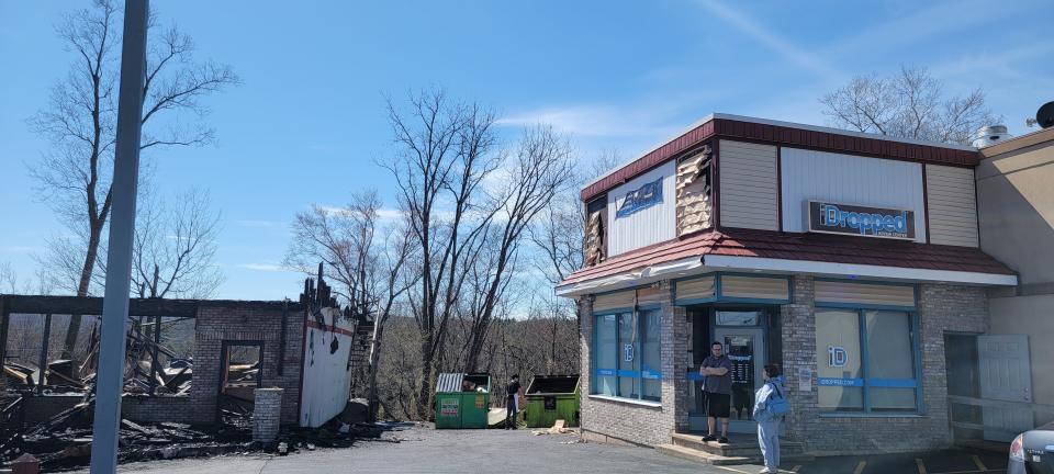 iDropped, a cell phone repair shop, sustained fire damage while neighboring Yusan Sushi & Ramen burned down in the early morning hours of Monday, April 8, 2024, on Route 611 in Stroud Plaza.
