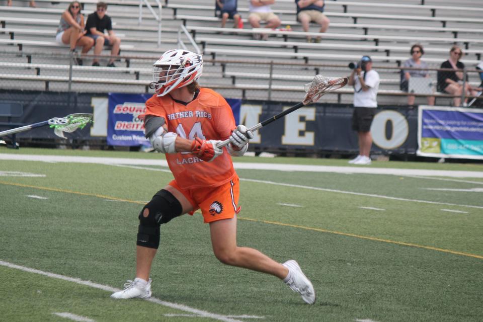 Bloomfield Hills Brother Rice's Hunter Polonkey fires in a first-quarter goal, one of his four during the game, as the Warriors captured the Division 1 boys' lacrosse state championship, 14-11, over Novi Detroit Catholic Central in East Grand Rapids on Saturday, June 10, 2023.