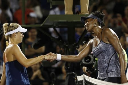 Mar 29, 2017; Miami, FL, USA; Venus Williams of the United States (R) shakes hands with Angelique Kerber of Germany (L) on day nine of the 2017 Miami Open at Crandon Park Tennis Center. Williams won 7-5, 6-3. Mandatory Credit: Geoff Burke-USA TODAY Sports