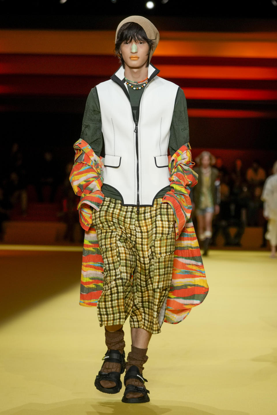 A model wears a creation as part of the Dsquared2 men's Spring Summer 2023 collection presented in Milan, Italy, Friday, June 17, 2022. (AP Photo/Luca Bruno)