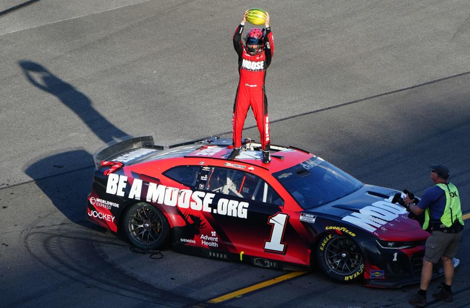 Ross Chastain celebrates winning the Geico 500 Sunday at Talladega Superspeedway.