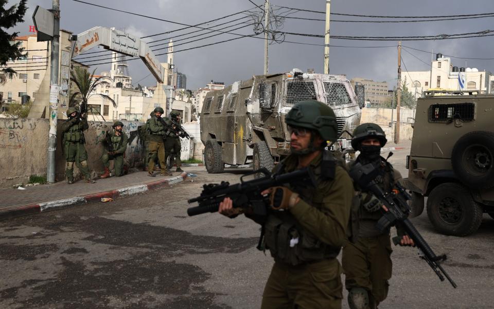 Israeli troops raid the Al-Amari refugee camp near Ramallah, in the occupied West Bank