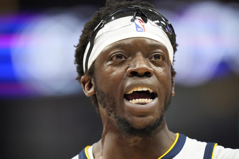 Denver Nuggets guard Reggie Jackson argues with an official during the first half of an NBA basketball game against the Utah Jazz Wednesday, Jan. 10, 2024, in Salt Lake City. (AP Photo/Rick Bowmer)