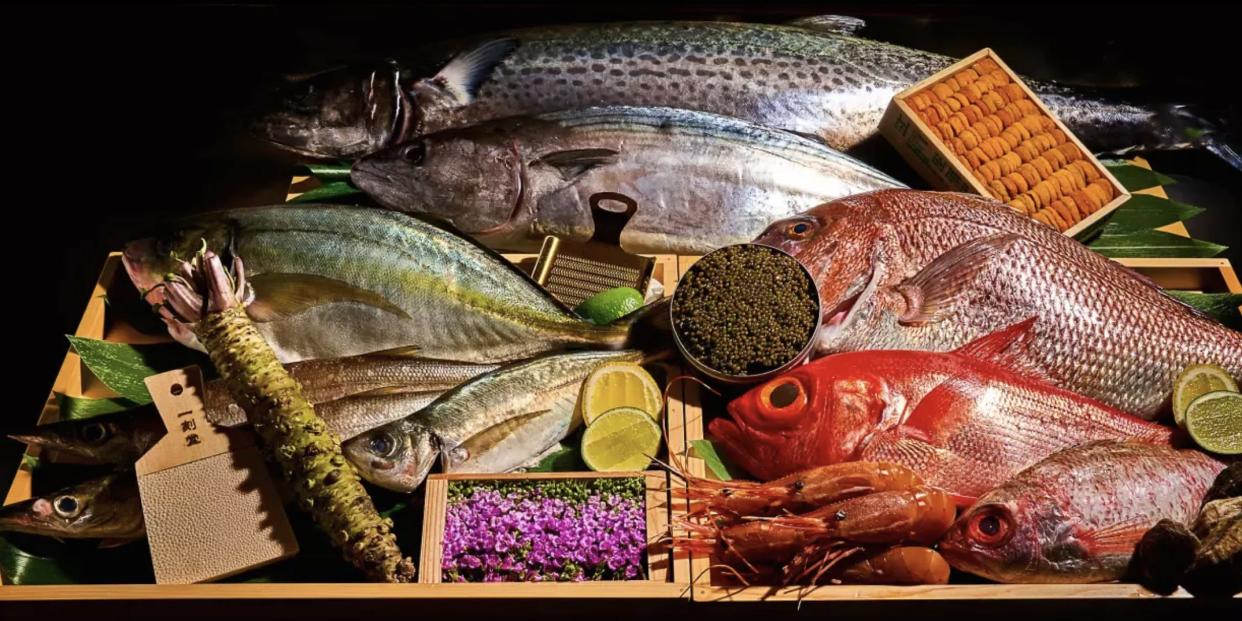 A variety of colorful fish is displayed on the website of Flyfish Club, billed as the world's first NFT restaurant.