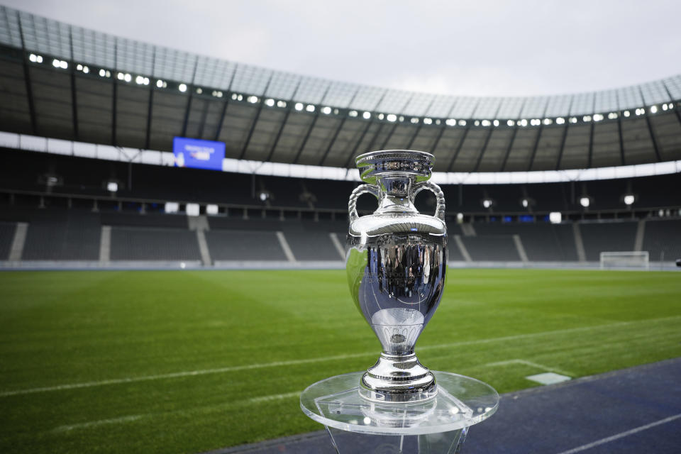 FILE - The trophy is on display during the presentation of the European soccer championship 'EURO 2024' trophy at the Olympic Stadium in Berlin, Germany, Wednesday, April 24, 2024. The Euros kick off in Munich, Friday June 14, when host country Germany plays Scotland at Bayern Munich's Allianz Arena. The tournament begins with six groups of four teams. (AP Photo/Markus Schreiber, File)