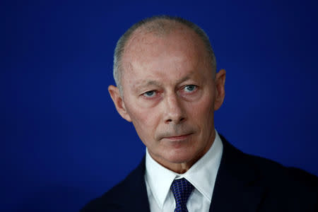 FILE PHOTO: Renault's acting deputy chief executive Thierry Bollore attends a news conference about the situation with Renault, at the Bercy Finance Ministry in Paris, France, November 21, 2018. REUTERS/Christian Hartmann