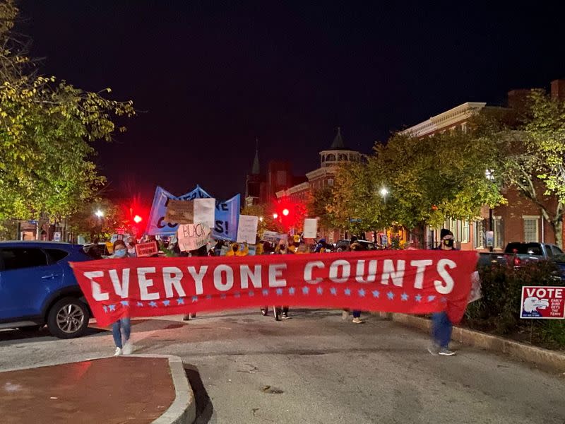 Activists rally at the Pennsylvania State Capitol Building to protest attempts to halt the counting of ballots cast in the state for the 2020 presidential election