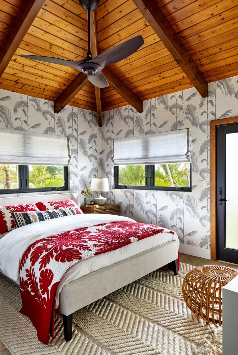 vacation home in maui, hawaii designed by breeze giannasio interiors daughter’s room bamboo on the property inspired a cole son wallcovering rug anthropologie red blanket and pillows traditional hawaiian, purchased locally bolster pom pom at home pouf danish design store