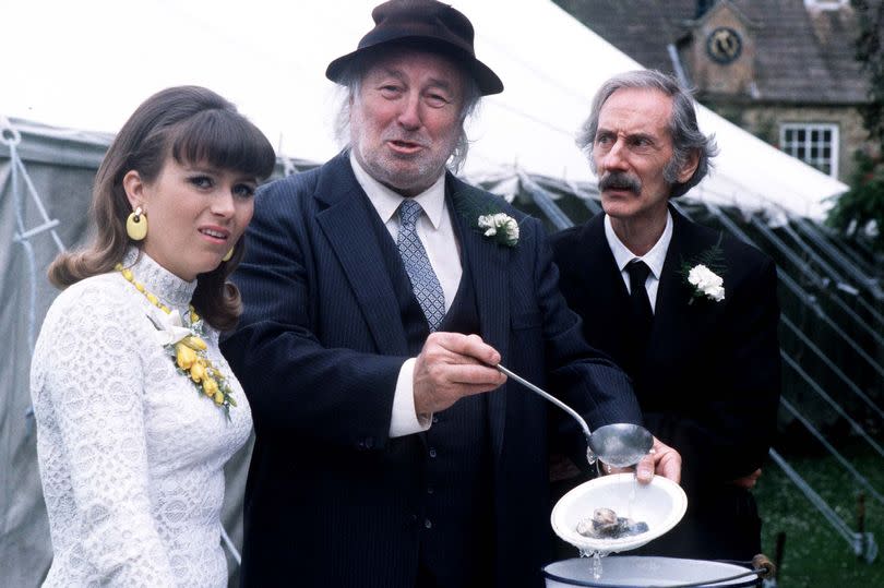 Greengrass with Gina ( Tricia Penrose) and chum Bernie Scripps (Peter Benson)