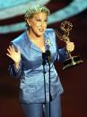 Actress and singer Bette Midler accepts the Emmy Award for Outstanding Performance in a Variety or Music Program for "Bette Midler: Diva Las Vegas," during the 49th Annual Emmy Awards program September 14. EMMY AWARDS